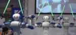 IREX 2009 : La danse des Robots Motoman avec les sabres laser.