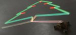 Un robot artiste dessinant avec de la lumière.
